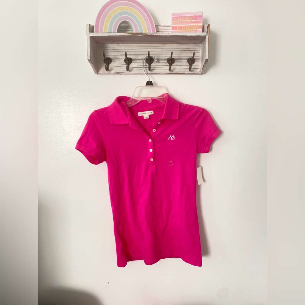 the cutest pink polo shirt, never worn in great condition